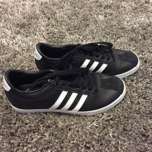 Black and white Adidas skater shoes